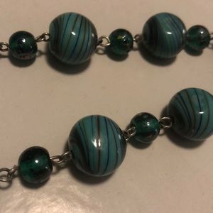Teal colored bead necklace